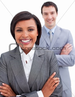 Beautiful businesswoman posing in front of her colleague