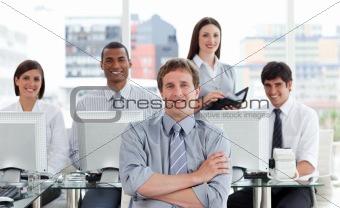 Portrait of a positive business team at work