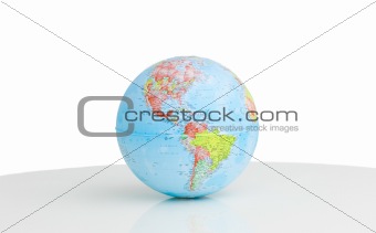 A terrestrial globe against a white background