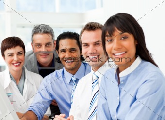 Portrait of ambitious business team at work