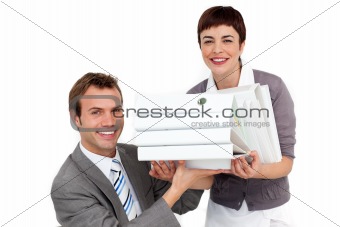 Young Businesswoman bringing a pile of folders to her manager 