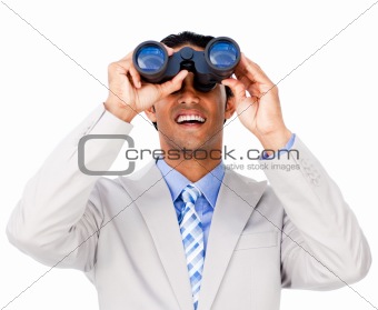 Smiling businessman using binoculars 