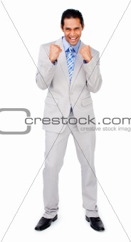 Happy businessman punching the air in celebration