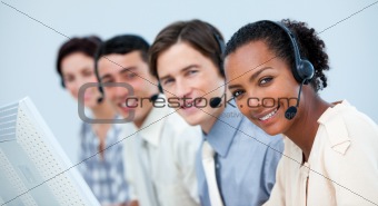A diverse business team working in a call center 