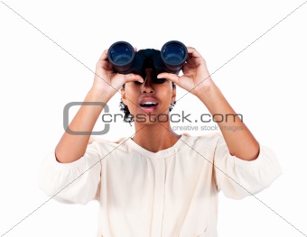 Surprised businesswoman looking through binoculars 