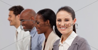 Diverse young business people sitting in a line 