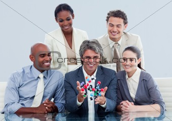 Animated business team showing a molecule
