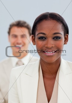 Close-up of a beautiful businesswoman and her colleague