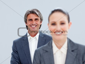Close-up of a mature businessman and his colleague
