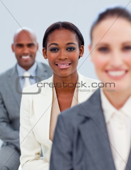 Close-up of an ethnic manager and her team