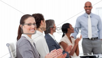 Positive business people clapping a good presentation 