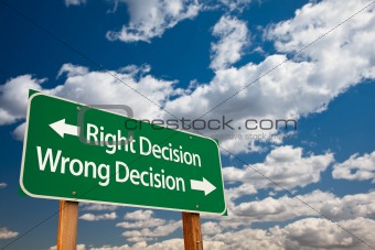Right Decision, Wrong Decision Green Road Sign with Copy Room Over The Dramatic Clouds and Sky.