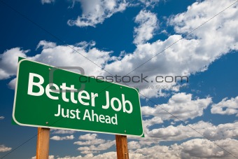 Better Job, Just Ahead Green Road Sign with Copy Room Over The Dramatic Clouds and Sky.