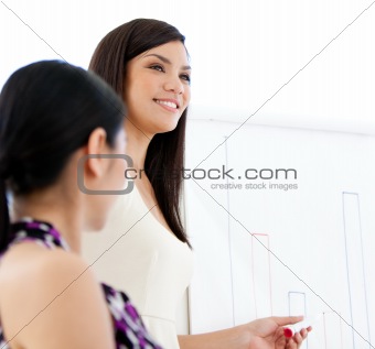 Smiling businesswoman doing a presentation 