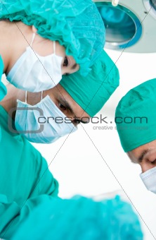 Medical partners looking at the patient 