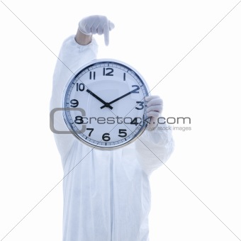 Man in biohazard suit holding clock.