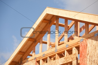 Abstract of New Home Construction Site Framing.
