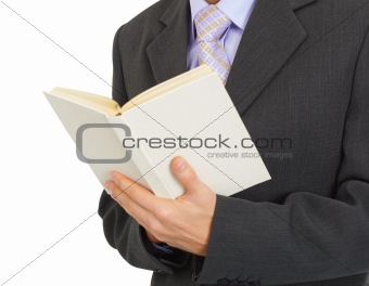 Book in hands of man