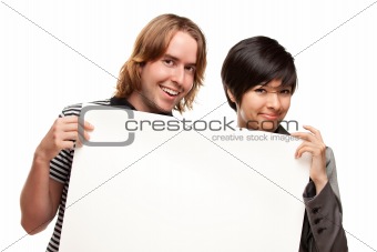 Attractive Diverse Couple Holding Blank White Sign Isolated on a White Background.