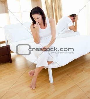 Worried couple finding out results of a pregnancy test 