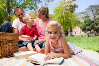 Happy family having a picnic in a park