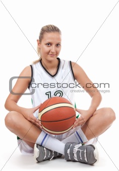 Attractive basketball player with soft smile 