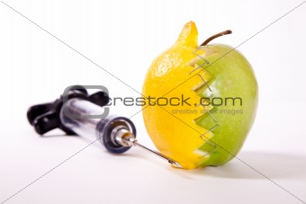 Lemon apple and syringe