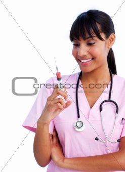 Portrait of an afro-american female doctor holding a syringe