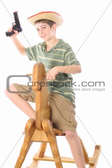 shot of a young boy playing cowboy
