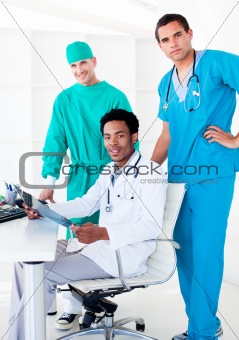 Assertive male doctors looking at X-Ray