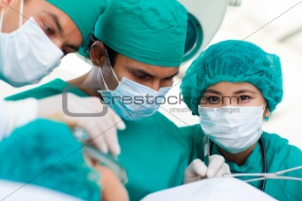 Confident surgeons during a surgery 
