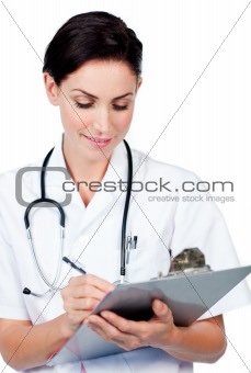 Portrait of a smiling nurse holding a stethoscope against a white background