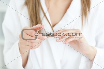 Close-up of woman holding a manicure tool 