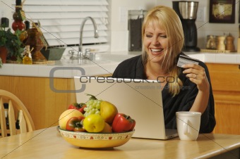 Woman Using Laptop for Ecommerce