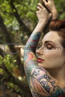 Attractive tattooed woman.