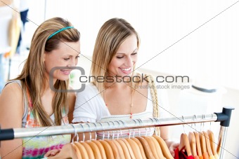 Two radiant women doing shopping 