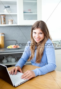 Positve woman with a laptop