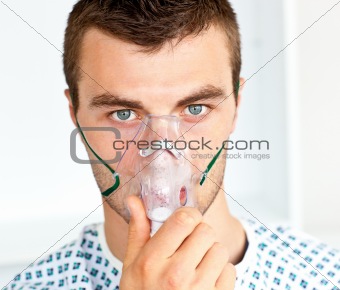Male handsome patient  wearing a mask