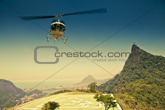 Helicopter in air in front of Corcovado Rio De Janeiro Brazil