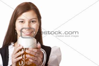 Portrait of happy Bavarian woman with Oktoberfest beer stein.