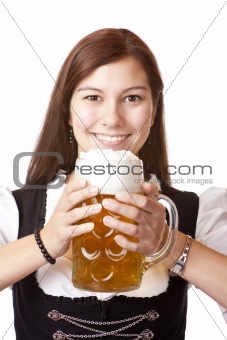 Portrait of happy Bavarian woman with Oktoberfest beer stein.