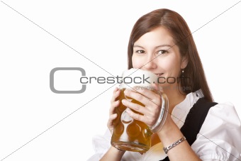 Beautiful woman in dirndl cloth holds Oktoberfest beer stein