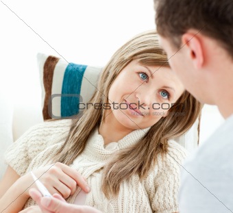 Smiling ill woman with her boyfriend holding pills