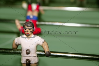 aged table football player macro detail