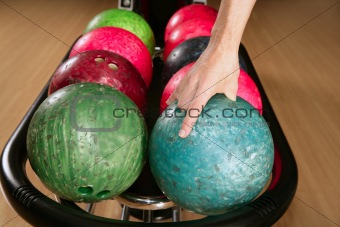 Bowling ball in player man hand