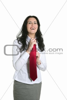 Brunette woman adjusting her necktie