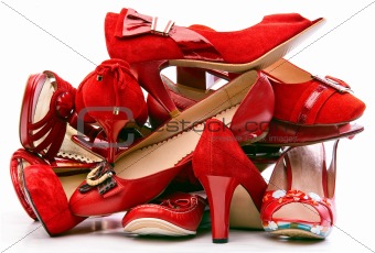 Pile of Female Red Shoes