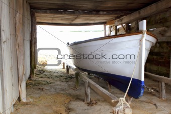 Formentera boat stranded on wooden rails