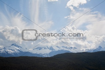 Mountain peaks and dramatic sky