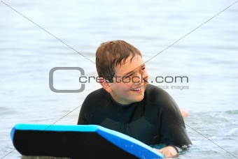 Smiling Teen Surfer